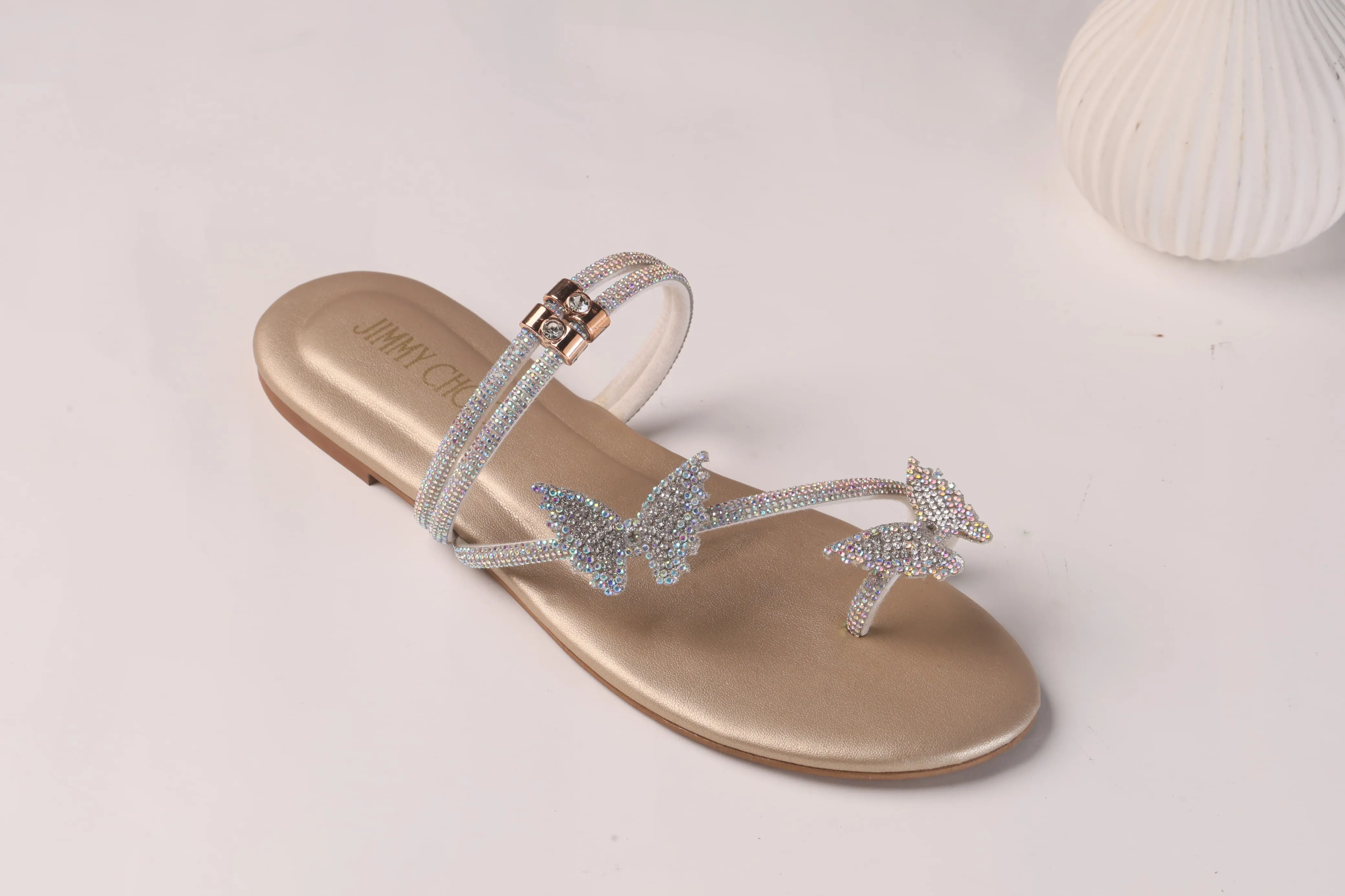 JIMMY CHOO MASH STRAP BUTTERFLY SLIPPERS - GOLD