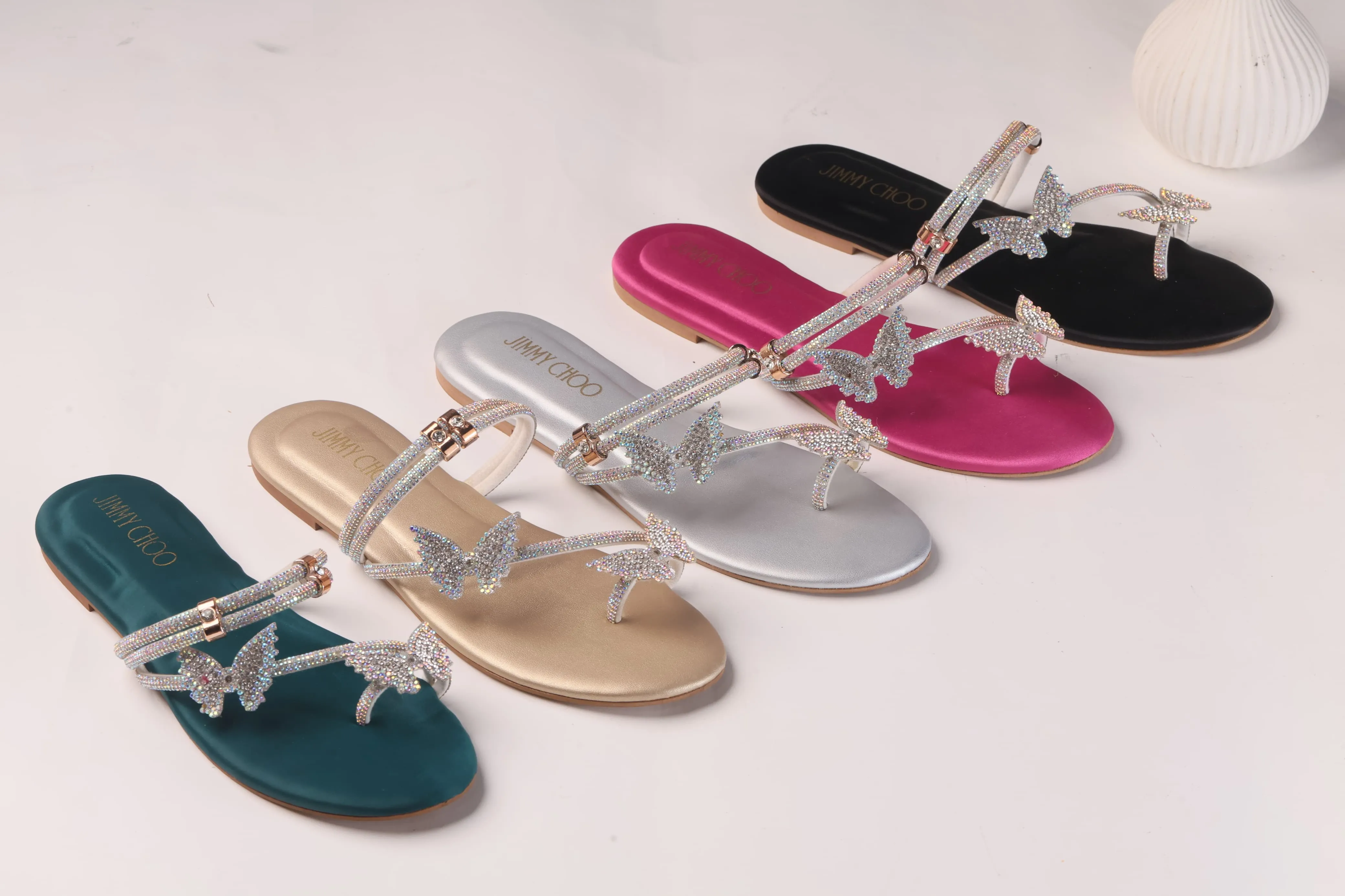 JIMMY CHOO MASH STRAP BUTTERFLY SLIPPERS - GOLD