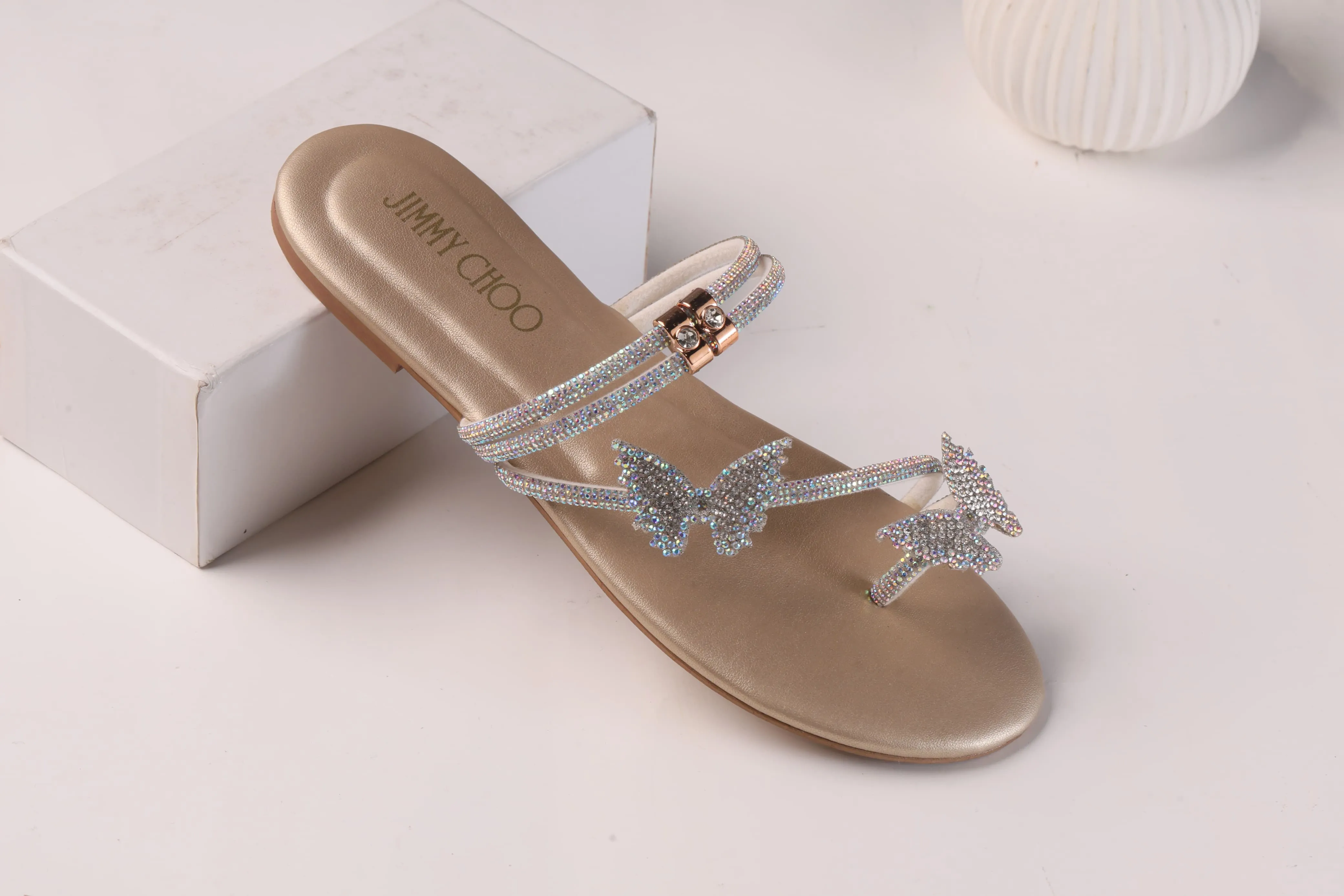 JIMMY CHOO MASH STRAP BUTTERFLY SLIPPERS - GOLD